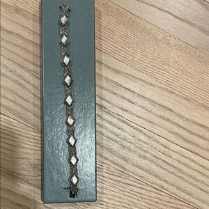 Elegant Silver Bracelet with Iridescent Stones